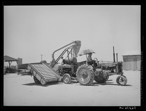 Combination hay loader and chopper used at the Casa Grande Valley Farms. Pinal County, Arizona. This machine was developed by members of the cooperative with the help of Mr. Walton, regional FSA (Farm Security Administration) farm supervisor