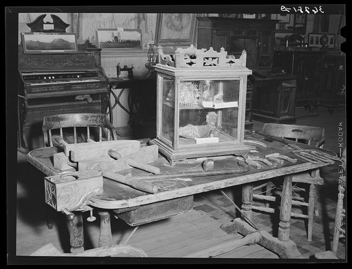 Old faro table and other objects in the Bird Cage museum. Tombstone, Arizona