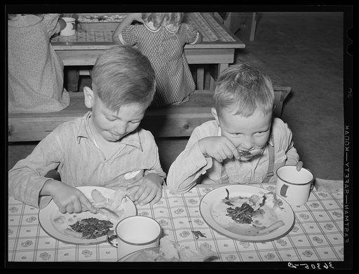 Boys eating their lunch at the WPA (Work Projects Administration) nursery school at Casa Grande Valley Farms. Pinal County, Arizona