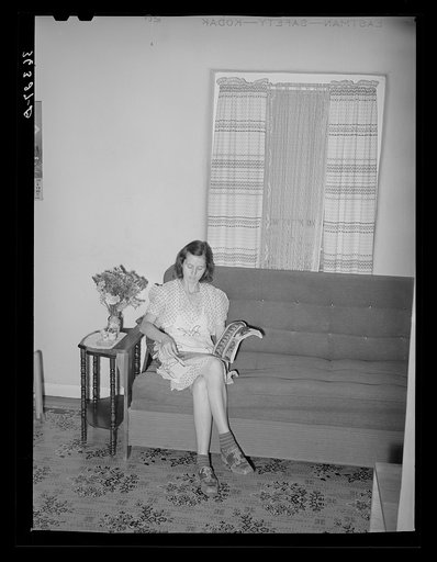 Wife of member of the Casa Grande Valley Farms, Pinal County, Arizona, in her living room