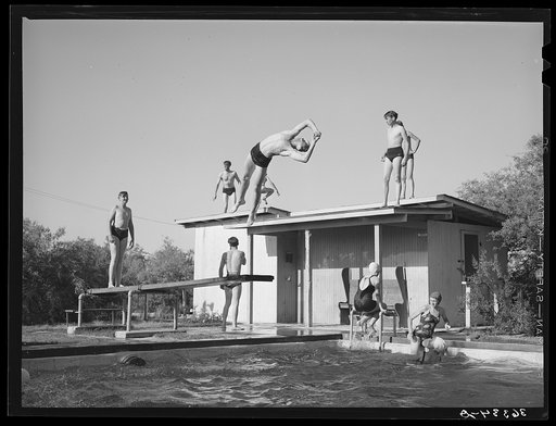 Youngsters in the swimming pool at the dude desert ranch at Coolidge, Arizona