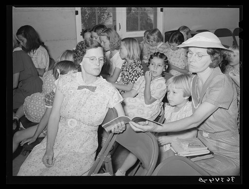 Singing at Sunday school at the community house at the Casa Grande Valley Farms. Pinal County, Arizona
