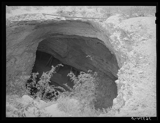 The Million Dollar Stope from which a million dollars worth of silver was taken in Tombstone's initial boom. Stope mining is carried on in timber- supported passages. The passages lead for miles under the surrounding county and connect with other mines. Tombstone, Arizona