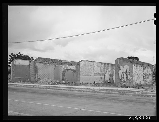 Walls of old building crumbling on the main street of Tombstone, Arizona