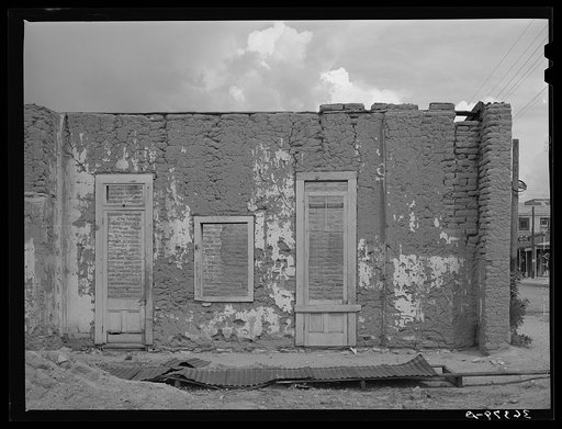 Cracking adobe walls in abandoned building in Tombstone, Arizona