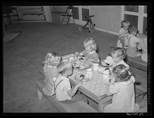 Children eating their lunch at the WPA (Work Projects Administration) nursery school at the Casa Grande Valley Farms. Pinal County, Arizona