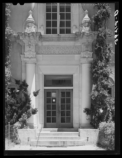 Entrance to offices of Burro Mountain Copper Company. Tyrone, New Mexico. This copper company is no longer actively engaged in mining in this section but is attempting to make the town with its company housing into a summer resort