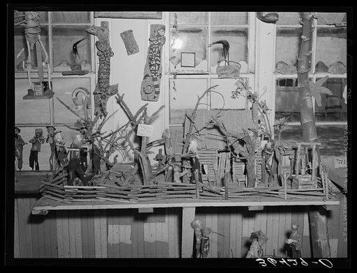 Ballad of the Martins and the Coys interpreted in papier mache and wood sculpture by Homer Tate. Safford, Arizona
