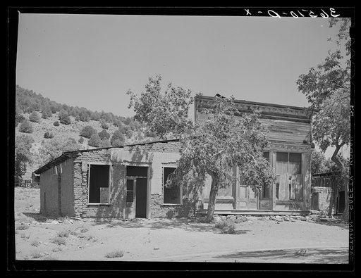 Untitled photo, possibly related to: Old store building at Georgetown, New Mexico. The mining operations dates back to the Spanish conquistadores and is now abandoned