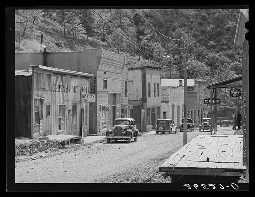 Untitled photo, possibly related to: Main street of Mogollon, New Mexico, second largest gold mining town in the state. New Mexico