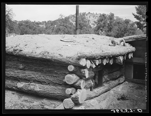 Detail of dugout. Pie Town, New Mexico. Notice that the roof is dirt over pinon poles