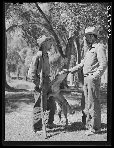 Rancher and herder talking. Catron County, New Mexico