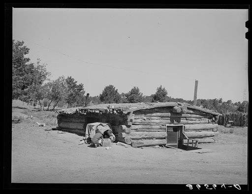 Untitled photo, possibly related to: Children playing in front of dugout. Pie Town, New Mexico
