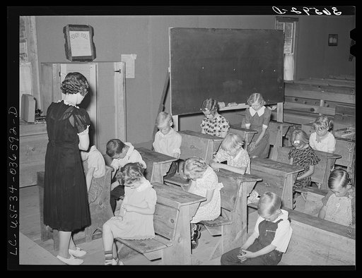 School opens with prayer. This is the private school in the Farm Bureau building. Pie Town, New Mexico