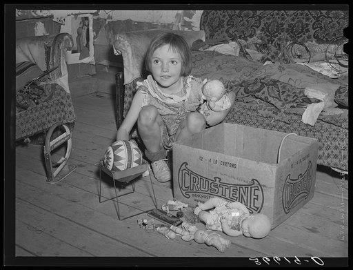 Untitled photo, possiby related to: Josie Caudill with her toys. Pie Town, New Mexico