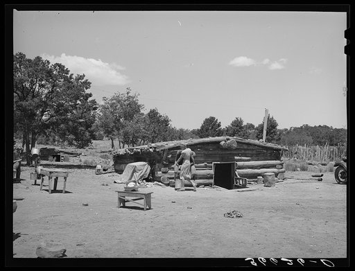 Untitled photo, possibly related to: Mr. and Mrs. Caudill moving furniture from their dugout. Pie Town, New Mexico