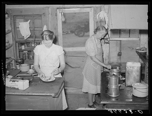 Mother and daughter working in the kitchen of the cafe at Pie Town, New Mexico. The daughter with her husband run the cafe