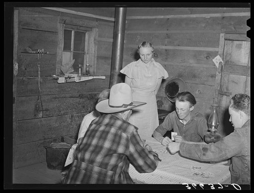 A hand of poker at the Forty-two party. Pie Town, New Mexico