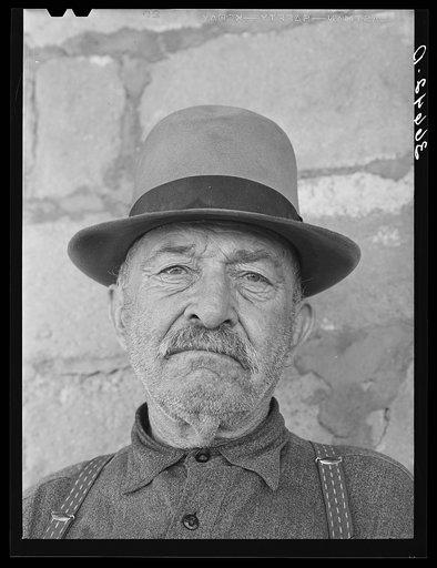 Untitled photo, possibly related to: Uncle Bill, old character living at Reserve, New Mexico. He was once a cowboy rancher. He now runs a saloon