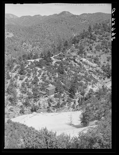 Mill and office buildings with tailings in foreground. Mogollon, New Mexico