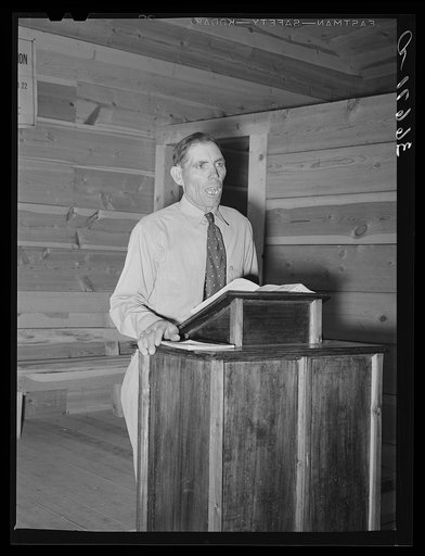 Mr. Leatherman, homesteader from Texas, leading the singing at church services. Pie Town, New Mexico