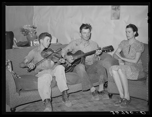 Farmer, his wife, and brother in close harmony. Pie Town, New Mexico