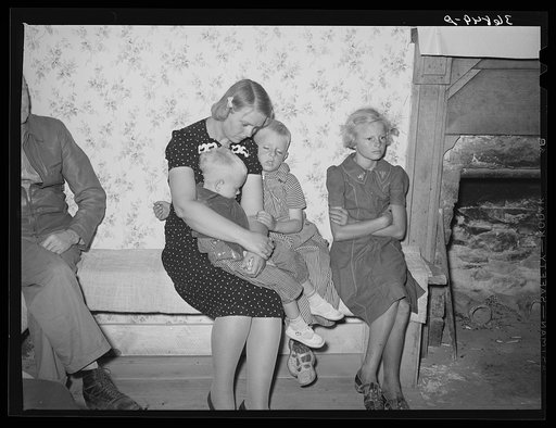 Tired spectators at the square dance. Pie Town, New Mexico