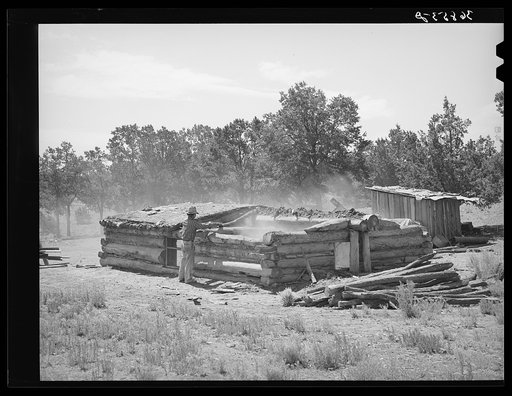 A neighbor who is helping Faro Caudill tear down his dugout. Pie Town, New Mexico