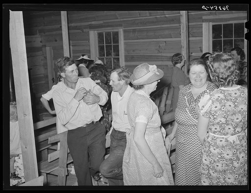 Group of farm people at the community sing. Pie Town, New Mexico