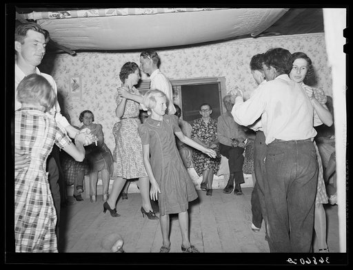 The broom dance at the square dance. Pie Town, New Mexico. The extra girl or man dances around with a broom for a partner. Then drops broom loudly; everyone must change partners and the one left out in the exchange must then dance with the broom