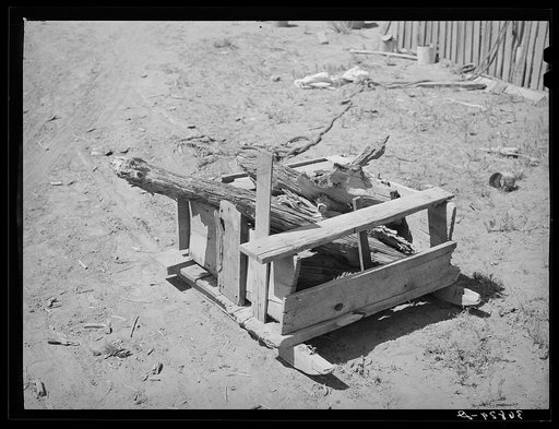 Sled for hauling wood, homesteader's farm. Pie Town, New Mexico. The abundance of wood for cooking and fuel is a never-ending source of delight to the farmers from the plains of Texas. "I'm never going to live again where the wood is too far away for my wife to gather it," a homesteader exclaimed wi