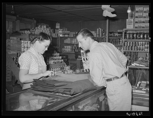 The clerk and a customer in the general store. Mogollon, New Mexico