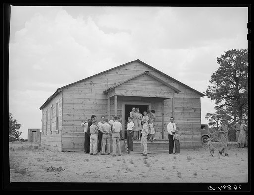 Farm folks in front of church before community sing starts. Pie Town, New Mexico