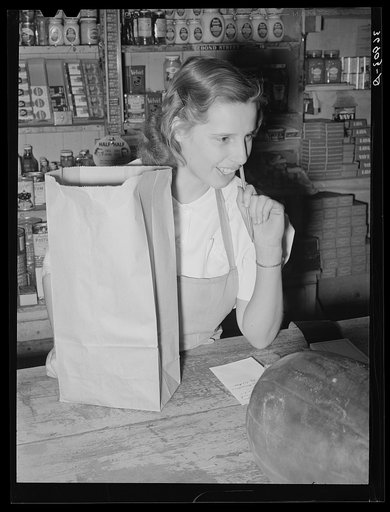 Clerk in the commissary. Mogollon, New Mexico