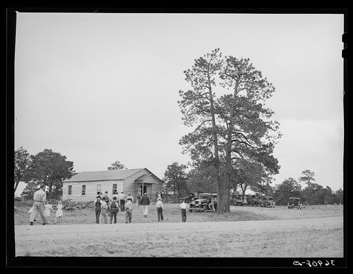 Folks gathering at the church for the all-day community sing. Pie Town, New Mexico