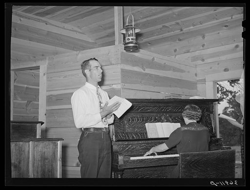 Leading the singers at the community sing. Pie Town, New Mexico