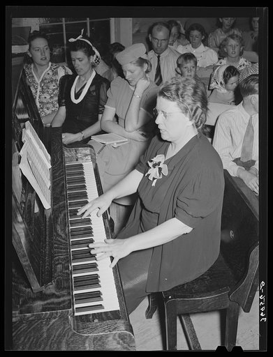 Untitled photo, possibly related to: Pianist at community sing. Pie Town, New Mexico. She and her husband were one of the first homesteaders