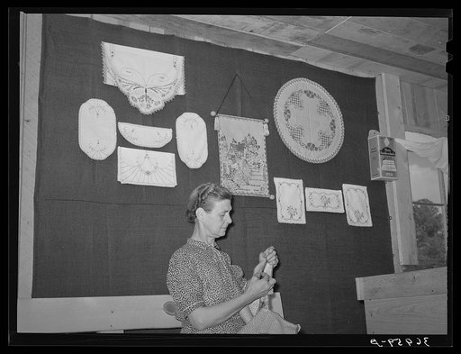 The proprietor of the curio shop is also well-known for her needle work.  She and her husband were homesteaders. Her husband is now sick and unable to farm. They live in town, renting out their log house and farm to a young couple. Pie Town, New Mexico