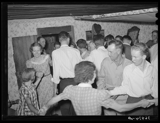 Dancing the Paul Jones at square dance. Pie Town, New Mexico