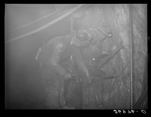 Untitled photo, possibly related to: Gold miner operating pneumatic drill at Mogollon, New Mexico