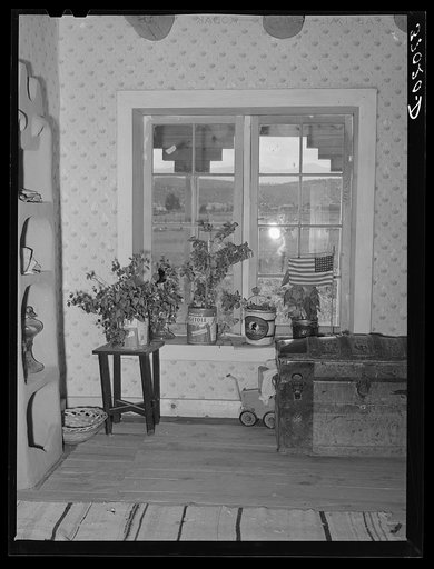 Detail of bedroom in Spanish-American farmer with homemade tools. Chamisal, New Mexico
