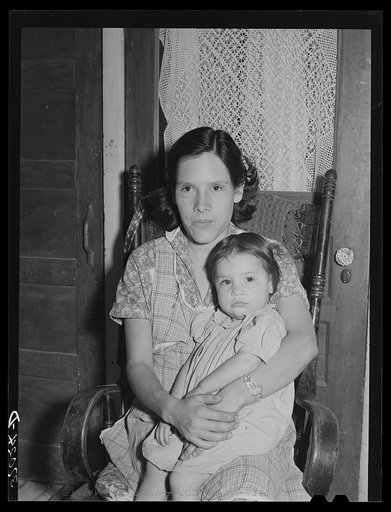 Wife of Spanish-American farmer and her child. Chamisal, New Mexico