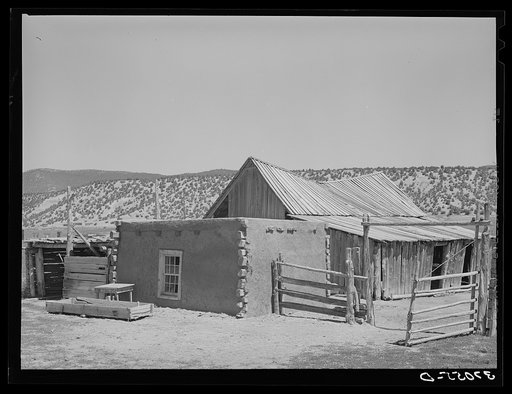 Adobe shed and barn of Spanish-American. Chamisal, New Mexico
