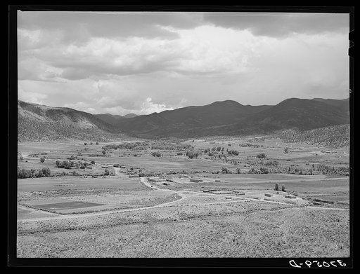The valley of the Rio Costilla at Amalia, New Mexico. The irrigated farmland is in the center with the grazing land surrounding