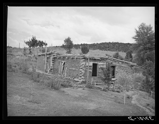 Barn and chicken coop of Spanish-American farmer. Chamisal, New Mexico
