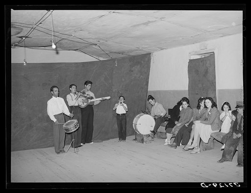 Orchestra and audience at Spanish-American traveling show. Penasco, New Mexico