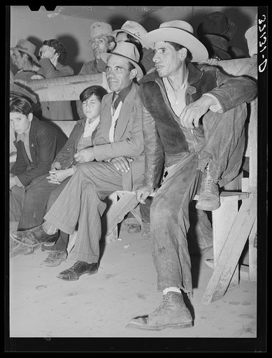 Spanish-American farmers watching show. Penasco, New Mexico
