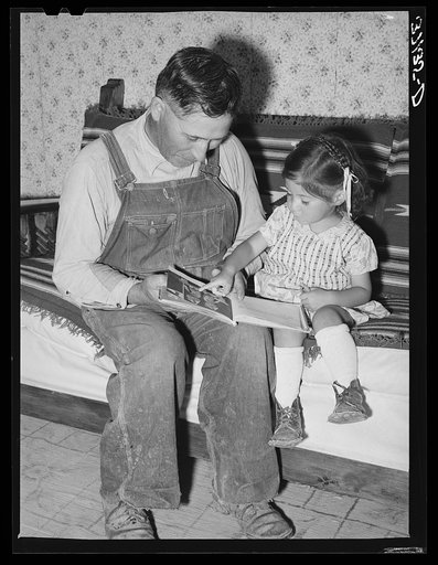Spanish-American farmer and his daughter. Chamisal, New Mexico