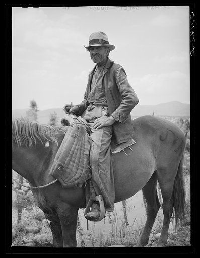 Spanish-American farmer on his horse. Rodarte, New Mexico