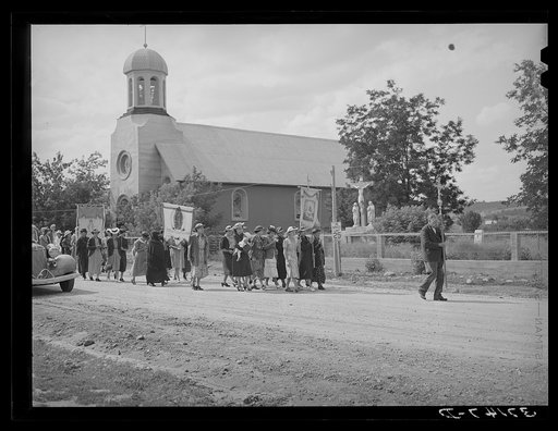 Procession of Spanish-American Catholics to honor a saint. Penasco, New Mexico